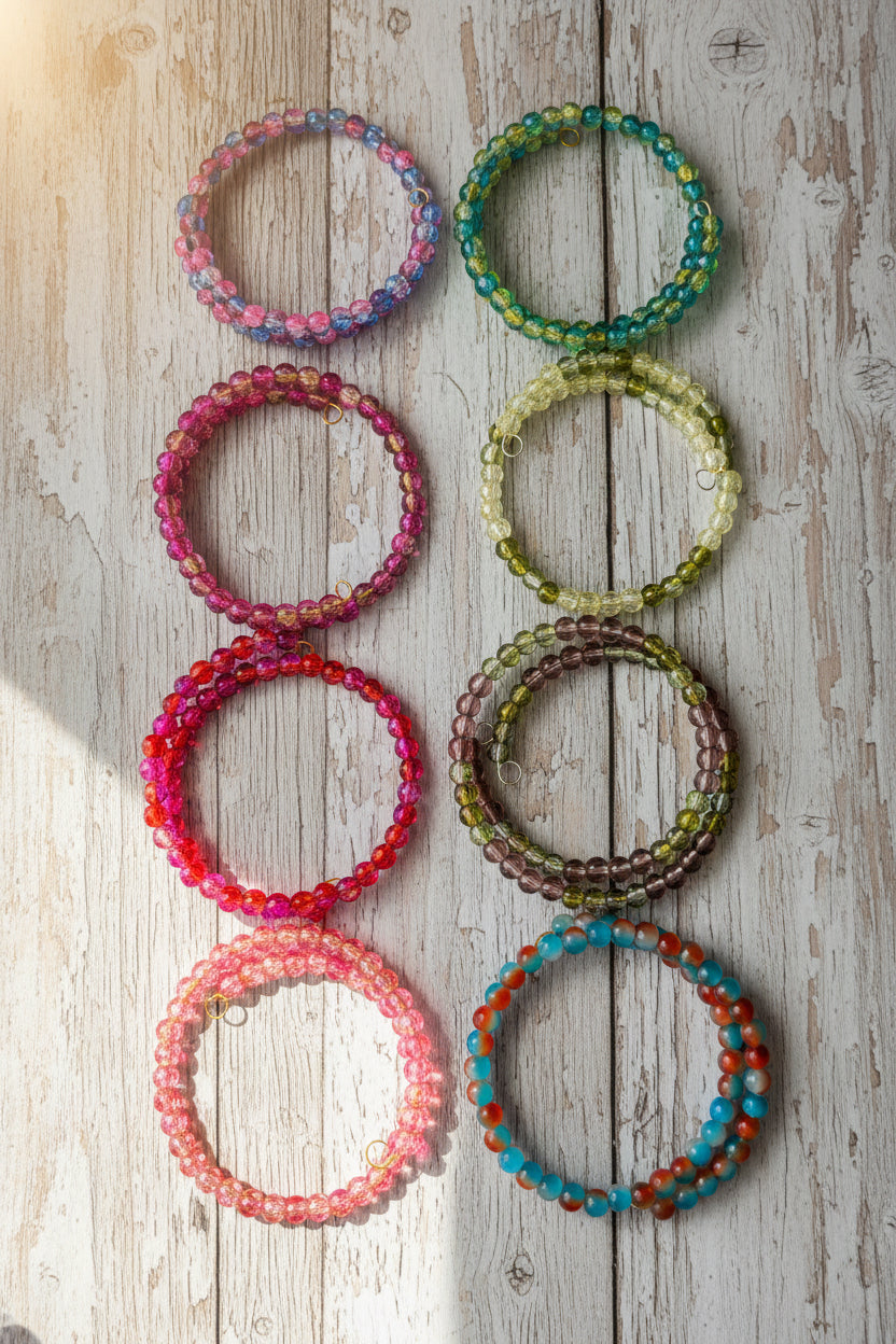 Eight beaded stretch bracelets arranged in two columns 
