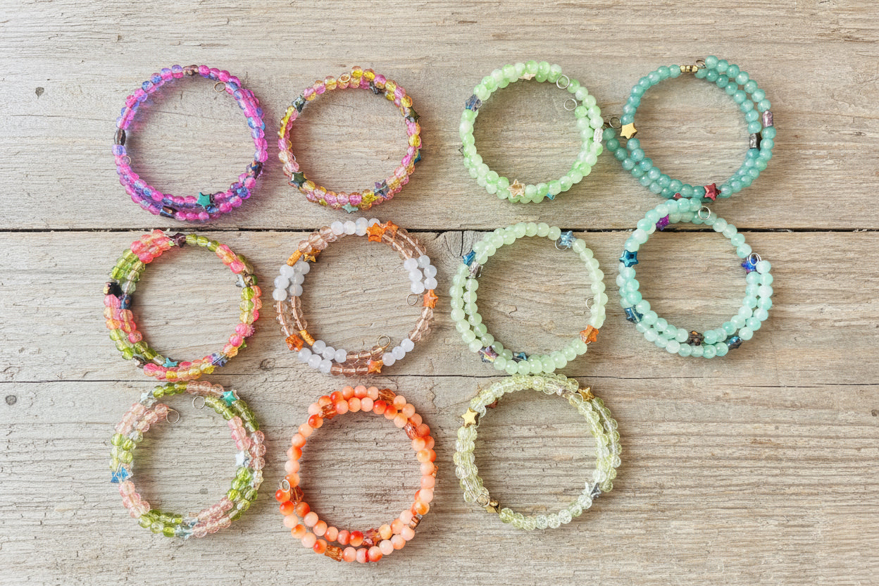 beaded stretch bracelets feature various colorful bead combinations including pink, green, orange, blue, and white,